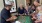 people huddled around a craps table